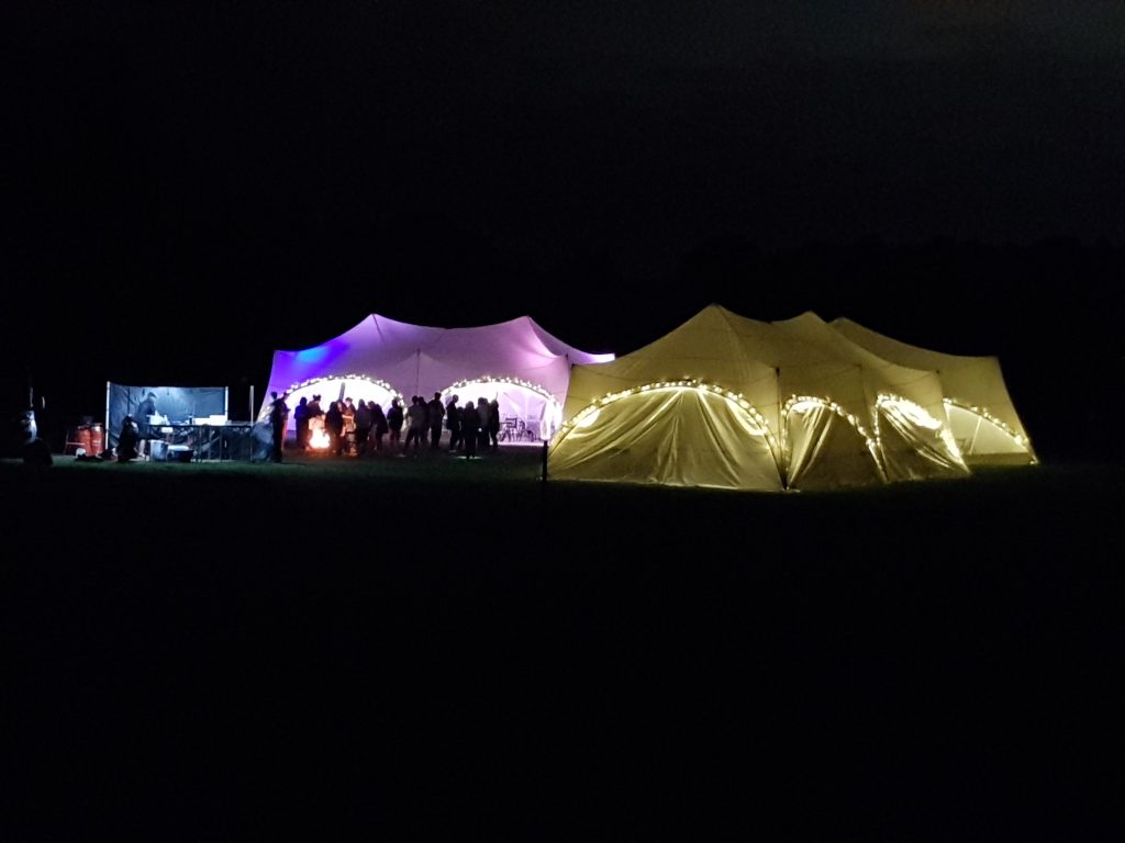 CU marquees at night